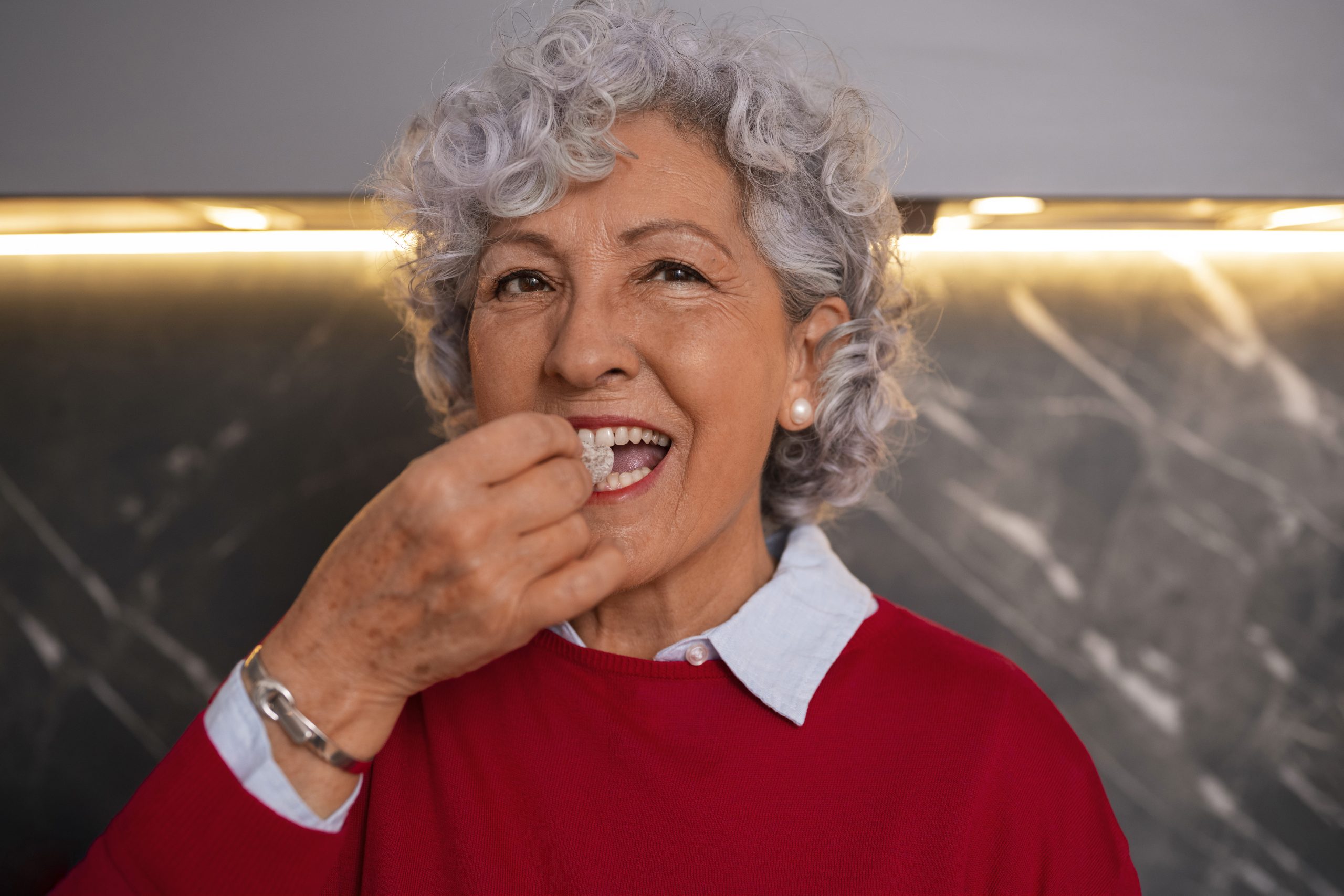 senior-woman-with-dental-implants senior woman with dental implants